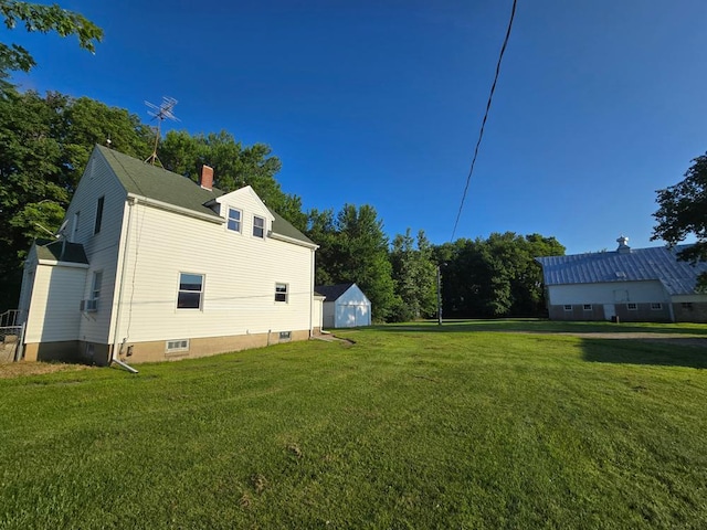 36789 State Highway 22, New Sweden Twp, MN 56082 - view of green lawn with a storage unit and cooling unit