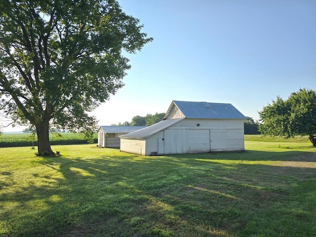 36789 State Highway 22, New Sweden Twp, MN 56082 - view of green lawn featuring an outbuilding