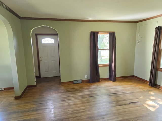 36789 State Highway 22, New Sweden Twp, MN 56082 - entryway with arched walkways, wood finished floors, and ornamental molding