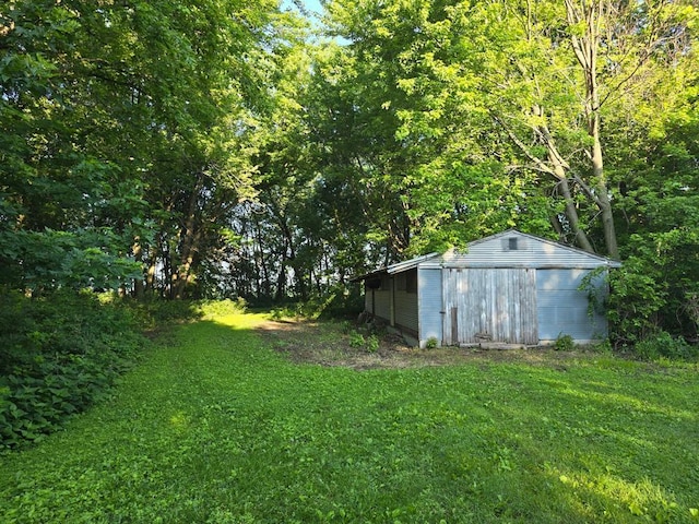 36789 State Highway 22, New Sweden Twp, MN 56082 - view of grassy yard with an outbuilding