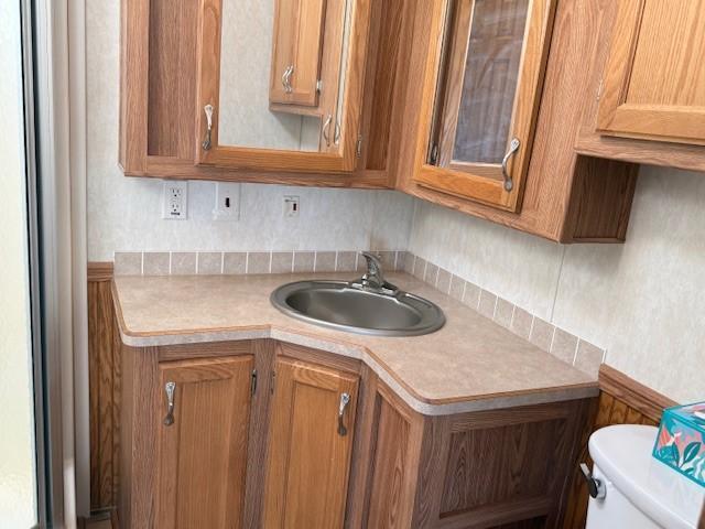 5055 Lake Mary Dr SW Unit 18, Alexandria, MN 56308 - bathroom with toilet and vanity
