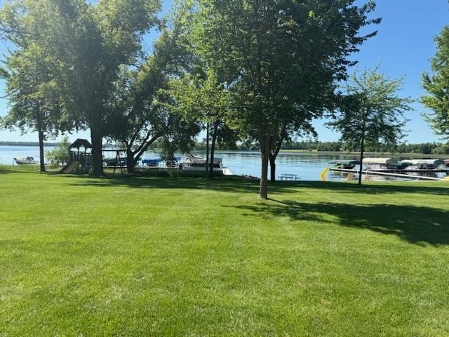 5055 Lake Mary Dr SW Unit 18, Alexandria, MN 56308 - view of property's community with a water view and a yard