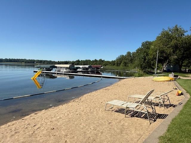 5055 Lake Mary Dr SW Unit 18, Alexandria, MN 56308 - surrounding community featuring a water view and a dock