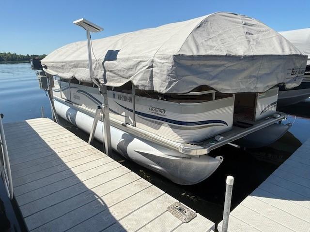 5055 Lake Mary Dr SW Unit 18, Alexandria, MN 56308 - dock with a water view and boat lift