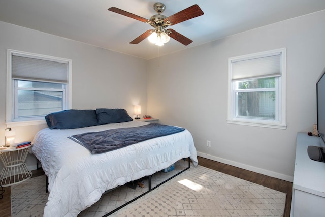 202 Silver St E, Mapleton, MN 56065 - bedroom with wood finished floors and ceiling fan