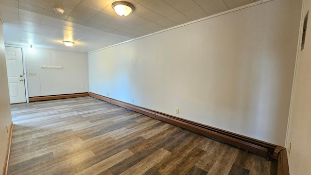 625 2nd Ave NE, Staples, MN 56479 - spare room featuring light wood-style floors, baseboard heating, and a smoke detector