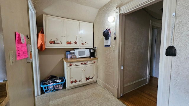 625 2nd Ave NE, Staples, MN 56479 - hallway with a textured wall and light floors
