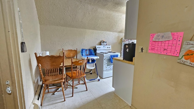 625 2nd Ave NE, Staples, MN 56479 - dining area with tile patterned floors, a textured wall, and a textured ceiling