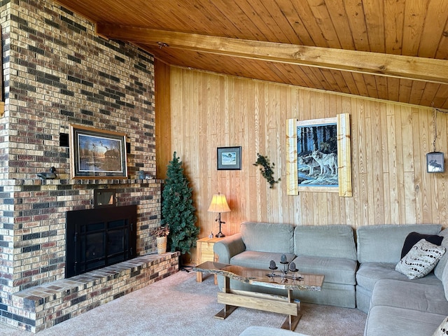 1938 Pine Cliff Rd NW, Walker, MN 56484 - living room featuring wood ceiling, wood walls, a brick fireplace, and carpet flooring