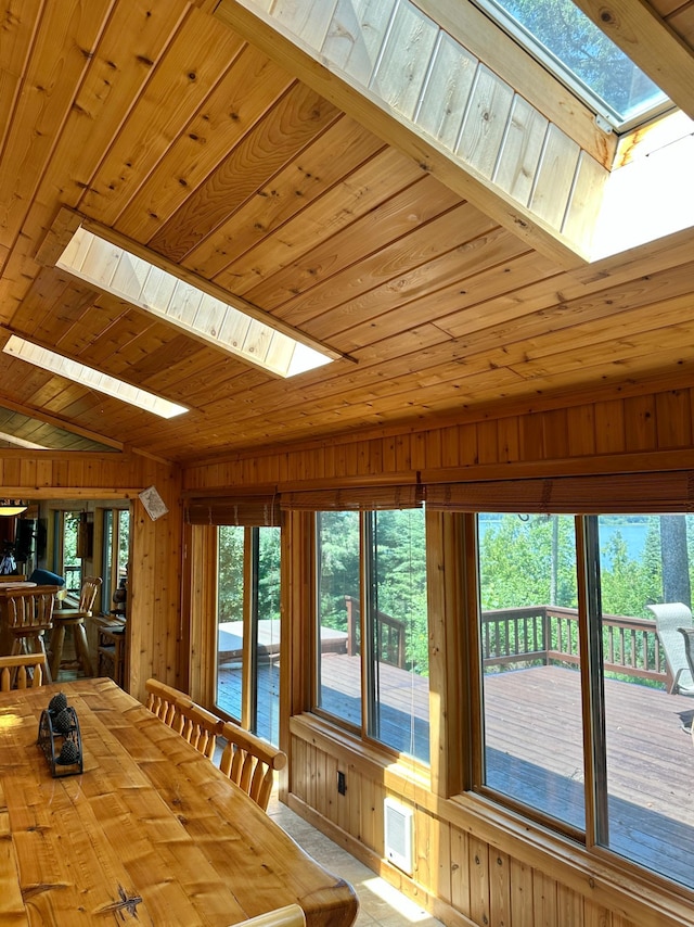 1938 Pine Cliff Rd NW, Walker, MN 56484 - unfurnished dining area featuring a skylight, wooden ceiling, and wood walls