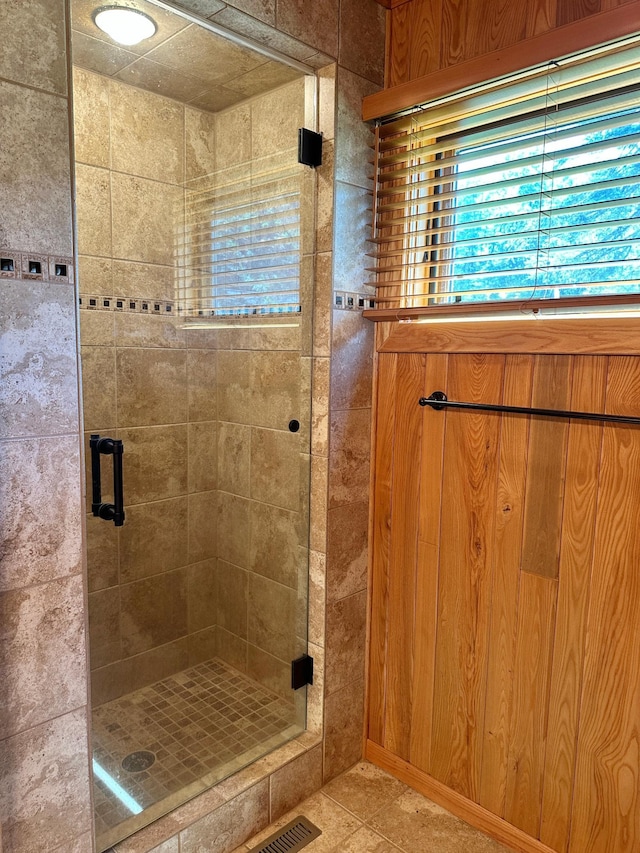 1938 Pine Cliff Rd NW, Walker, MN 56484 - full bathroom with a stall shower and tile patterned flooring
