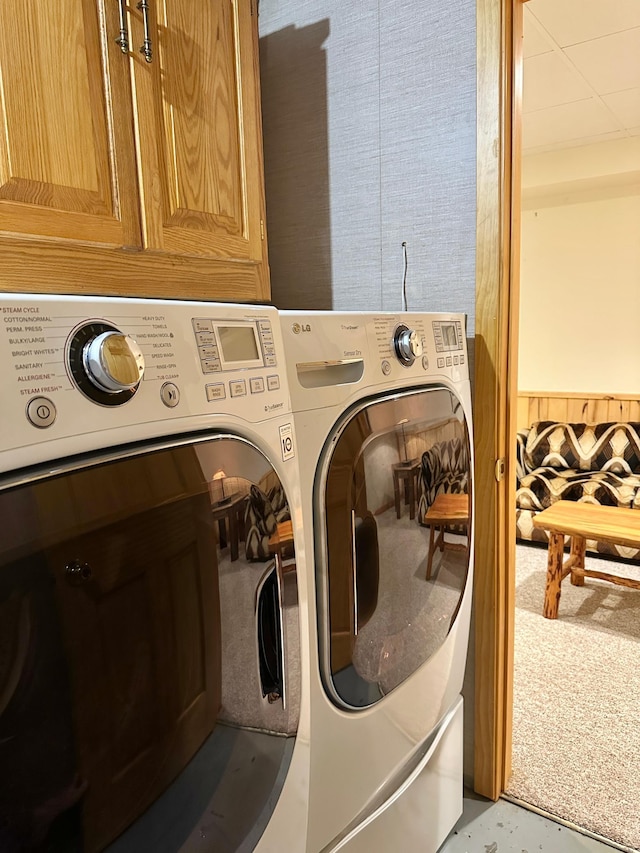 1938 Pine Cliff Rd NW, Walker, MN 56484 - laundry area with washing machine and dryer and cabinet space