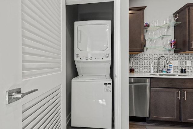 4617 Cobalt Ln, Woodbury, MN 55129 - washroom featuring stacked washer / dryer