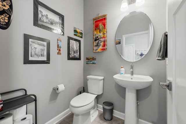 4617 Cobalt Ln, Woodbury, MN 55129 - half bath with toilet and tile patterned flooring