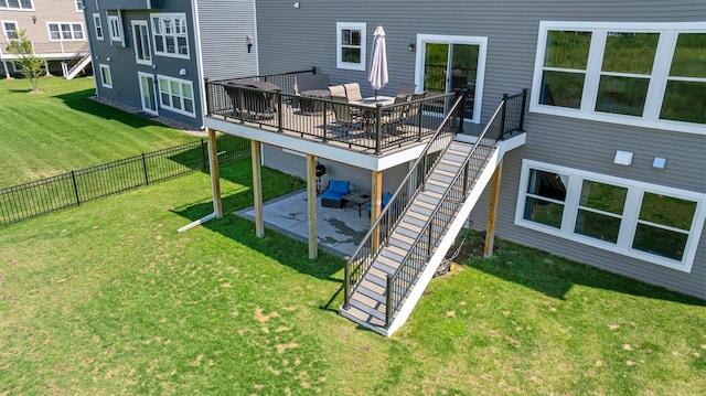 4617 Cobalt Ln, Woodbury, MN 55129 - back of property with stairway, a patio area, a fenced backyard, and a wooden deck