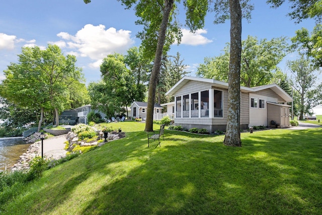 68018 217th St, Ellsworth Twp, MN 55324 - view of grassy yard featuring a sunroom