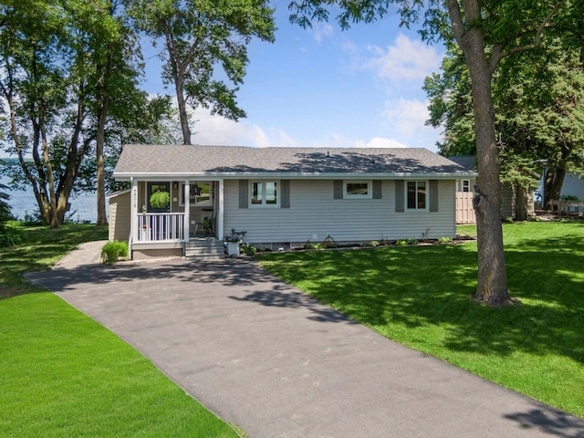 68018 217th St, Ellsworth Twp, MN 55324 - ranch-style home with a front lawn, a porch, driveway, and roof with shingles