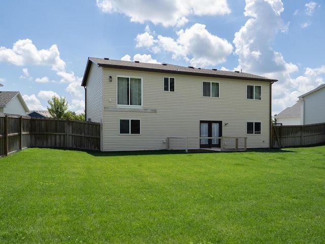 1049 Bellaire Blvd NW, Isanti, MN 55040 - back of house with a fenced backyard
