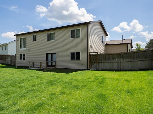 1049 Bellaire Blvd NW, Isanti, MN 55040 - rear view of property featuring french doors