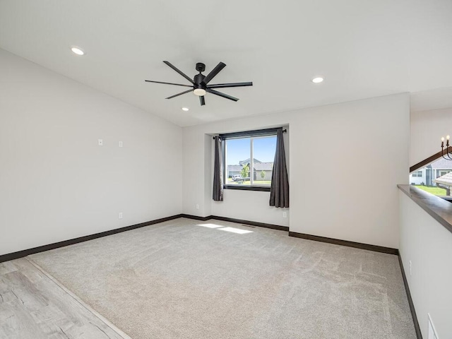 1049 Bellaire Blvd NW, Isanti, MN 55040 - carpeted spare room with ceiling fan and recessed lighting