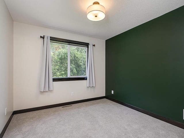 1049 Bellaire Blvd NW, Isanti, MN 55040 - unfurnished room with carpet floors