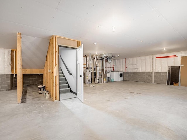 1049 Bellaire Blvd NW, Isanti, MN 55040 - unfinished below grade area with gas water heater, concrete block wall, stairs, and washer and clothes dryer