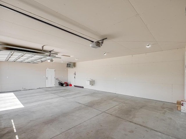 1049 Bellaire Blvd NW, Isanti, MN 55040 - garage featuring a garage door opener
