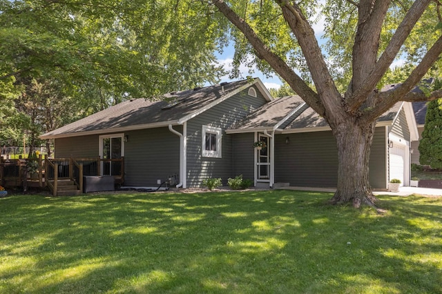 14301 Princeton Ave, Savage, MN 55378 - view of front facade with a shingled roof, a deck, a garage, and a front lawn