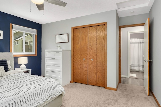 14301 Princeton Ave, Savage, MN 55378 - bedroom with carpet, a closet, a ceiling fan, and attic access