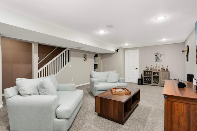 14301 Princeton Ave, Savage, MN 55378 - living room with a bar, light carpet, recessed lighting, and stairs