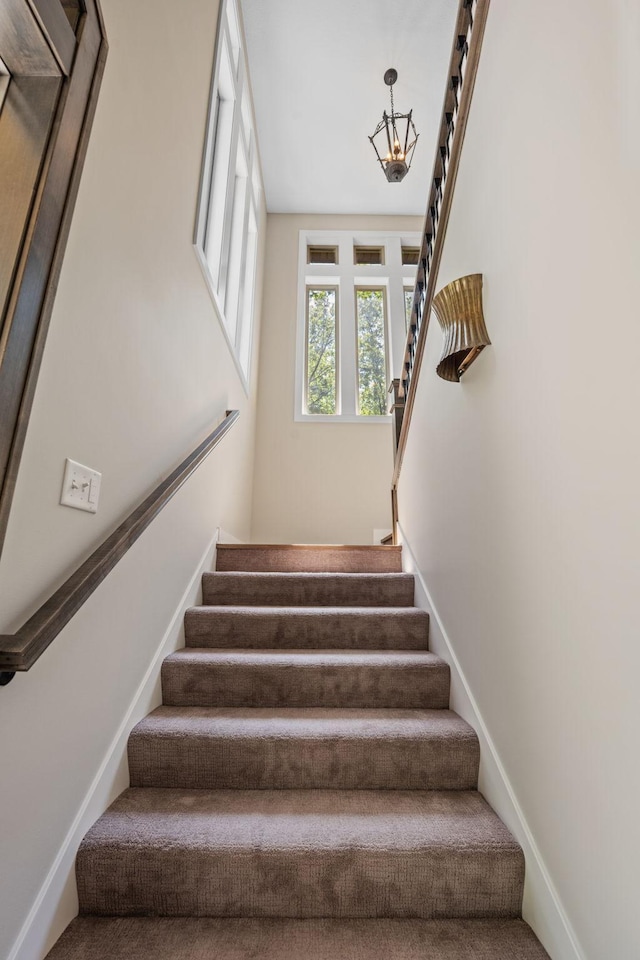 21386 Dorothy Way, Spring Lake Twp, MN 55372 - staircase with carpet floors and baseboards
