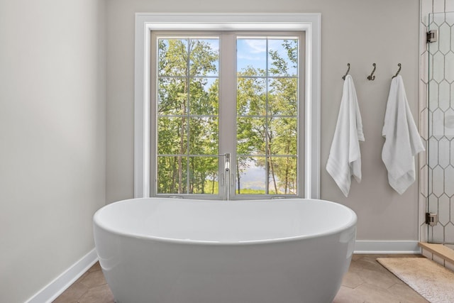 21386 Dorothy Way, Spring Lake Twp, MN 55372 - full bath with a soaking tub and tile patterned flooring