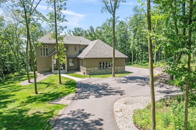 21386 Dorothy Way, Spring Lake Twp, MN 55372 - view of front of property with stone siding, asphalt driveway, a front lawn, and a shingled roof