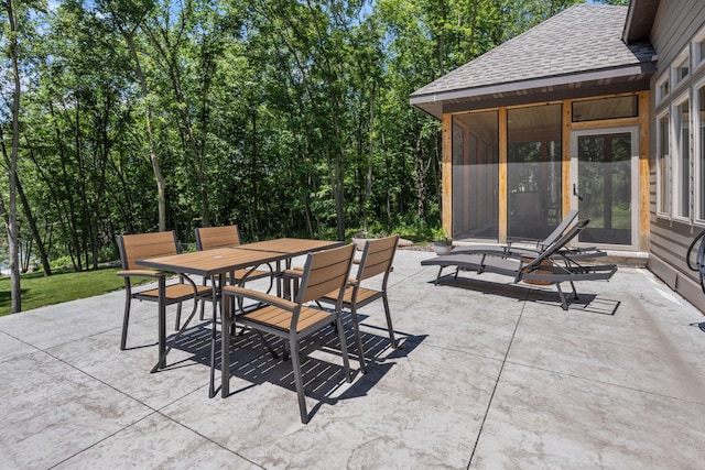 21386 Dorothy Way, Spring Lake Twp, MN 55372 - view of patio featuring a sunroom and outdoor dining area