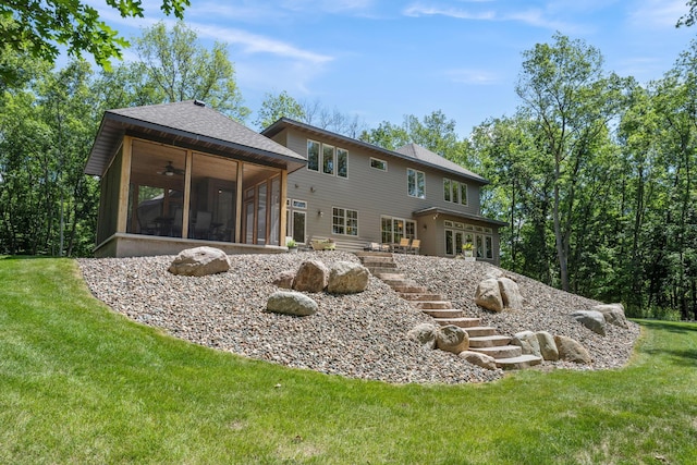 21386 Dorothy Way, Spring Lake Twp, MN 55372 - back of house featuring a sunroom, a ceiling fan, a yard, and stairs