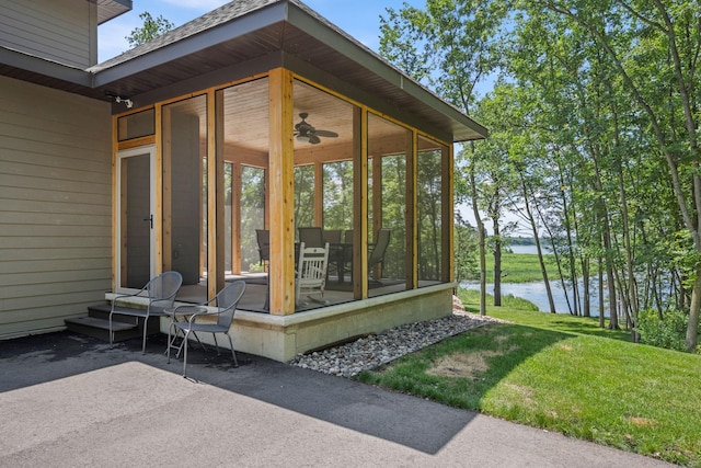 21386 Dorothy Way, Spring Lake Twp, MN 55372 - property entrance with a water view, ceiling fan, a yard, and a patio area