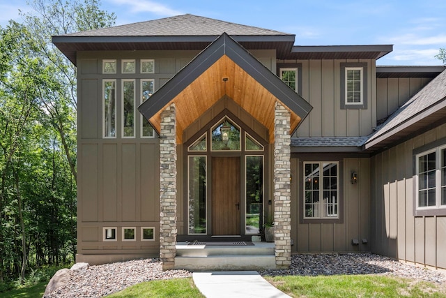 21386 Dorothy Way, Spring Lake Twp, MN 55372 - doorway to property featuring board and batten siding and a shingled roof