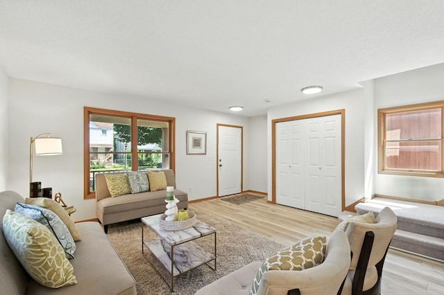 726 Thomas Ave, Saint Paul, MN 55104 - living area with baseboards and light wood-style flooring