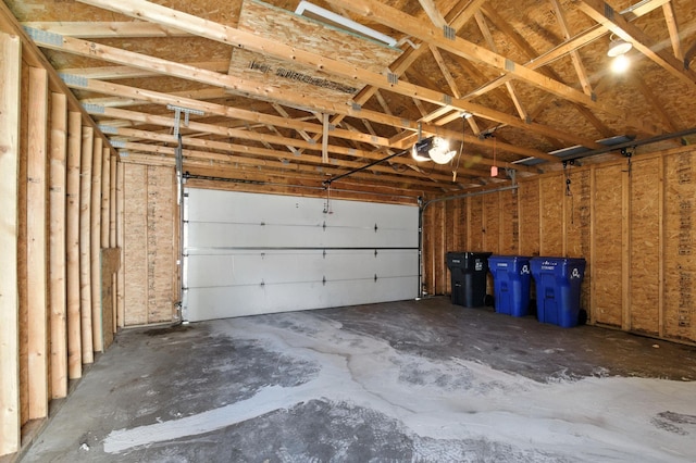 726 Thomas Ave, Saint Paul, MN 55104 - garage featuring a garage door opener