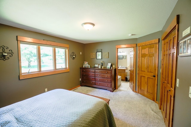 32433 Cedar St, Breezy Point, MN 56472 - bedroom featuring light colored carpet and ensuite bath