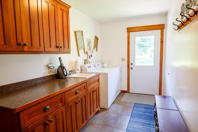 32433 Cedar St, Breezy Point, MN 56472 - laundry area with cabinet space, washer and dryer, and light tile patterned floors