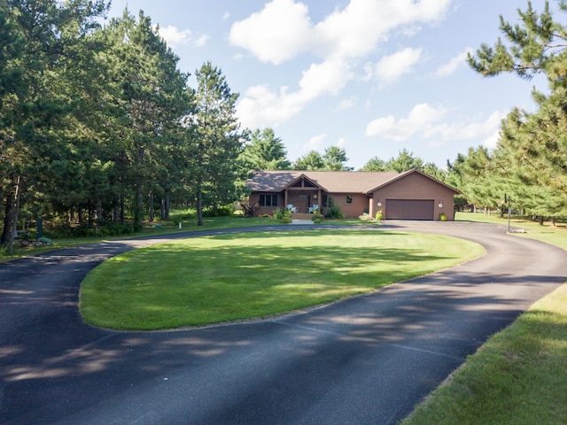 32433 Cedar St, Breezy Point, MN 56472 - single story home with asphalt driveway, a front yard, and a garage