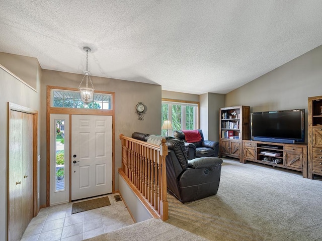 1483 Woods Creek Dr, Delano, MN 55328 - carpeted entryway featuring a textured ceiling