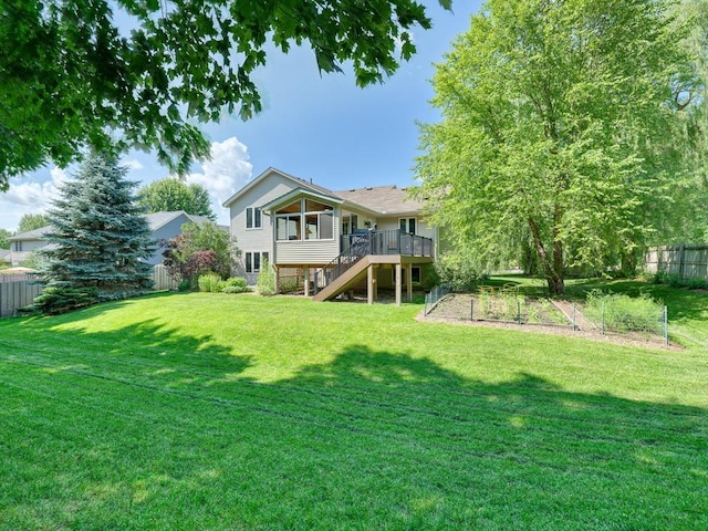 1483 Woods Creek Dr, Delano, MN 55328 - rear view of property featuring stairs, a deck, and a garden