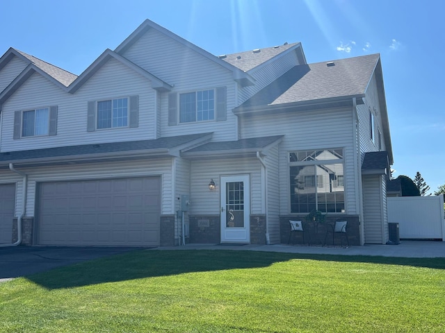 16886 Embers Ave, Lakeville, MN 55024 - townhome / multi-family property with a garage and a shingled roof