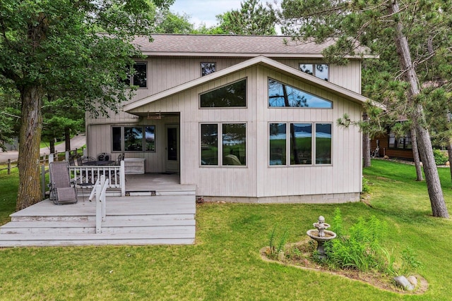 11959 Northgate Ln, Fifty Lakes, MN 56442 - rear view of house with a shingled roof, a yard, and a wooden deck