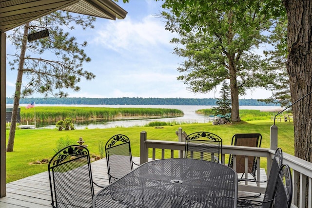11959 Northgate Ln, Fifty Lakes, MN 56442 - deck with outdoor dining space, a water view, and a lawn
