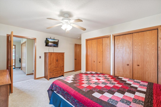 11959 Northgate Ln, Fifty Lakes, MN 56442 - carpeted bedroom featuring two closets and ceiling fan