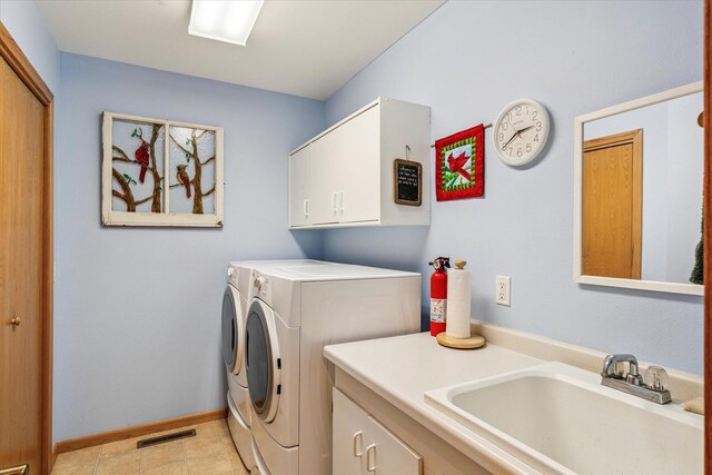 11959 Northgate Ln, Fifty Lakes, MN 56442 - washroom with cabinet space and washer and clothes dryer