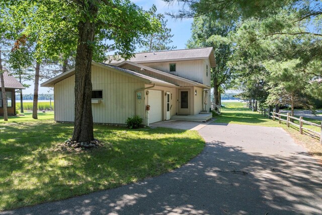11959 Northgate Ln, Fifty Lakes, MN 56442 - view of front of home with driveway and an attached garage